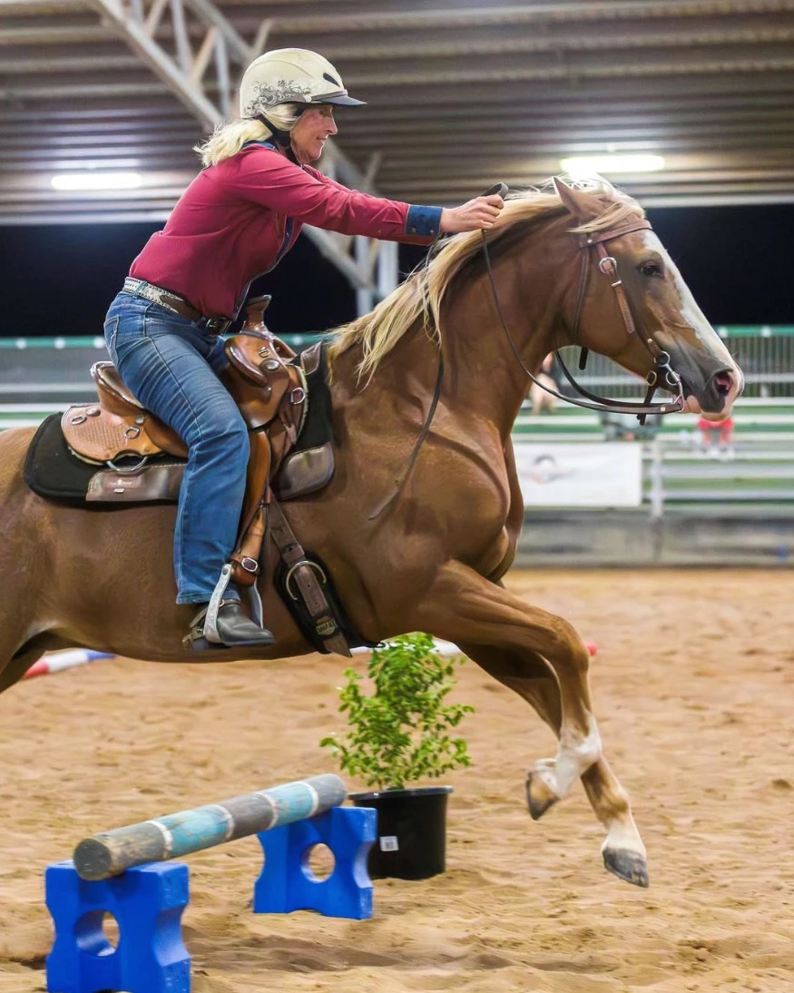 A Bundaberg & District Extreme Cowboy Racing competitor riding an obstacle course at speed